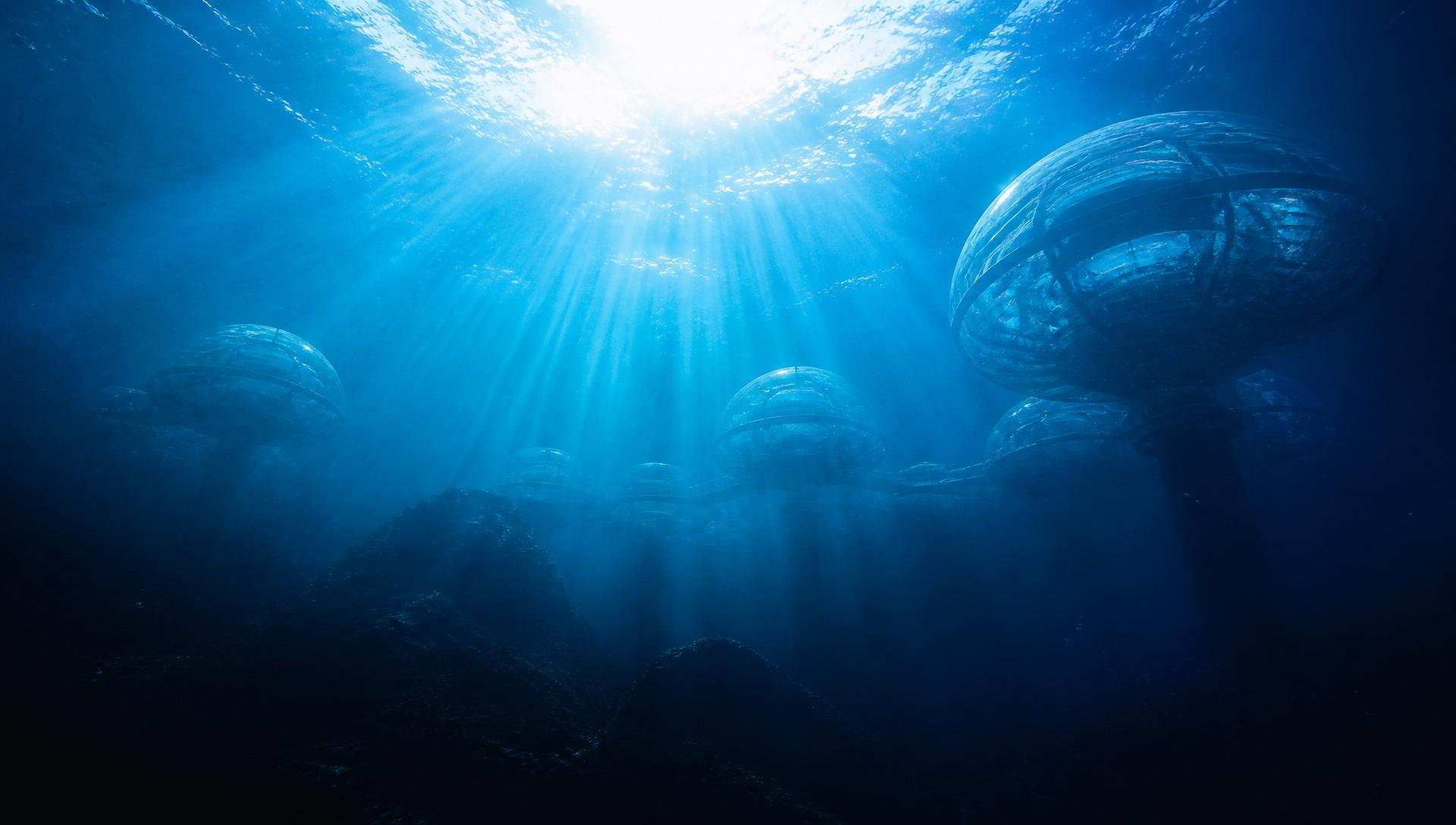 Sunlight filtering through the deep ocean toward visionary underwater domes
